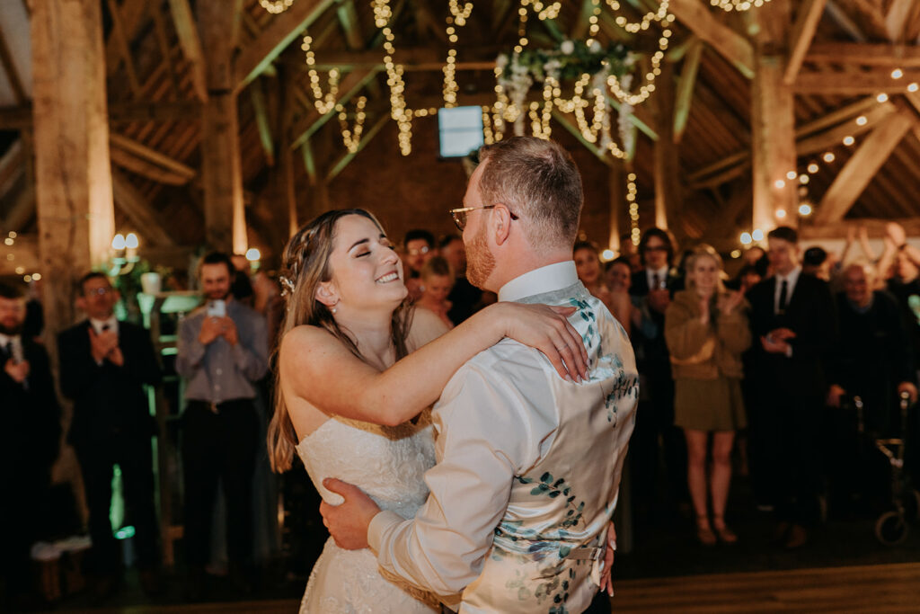 Emily and James share their first dance at Barford Park Barn