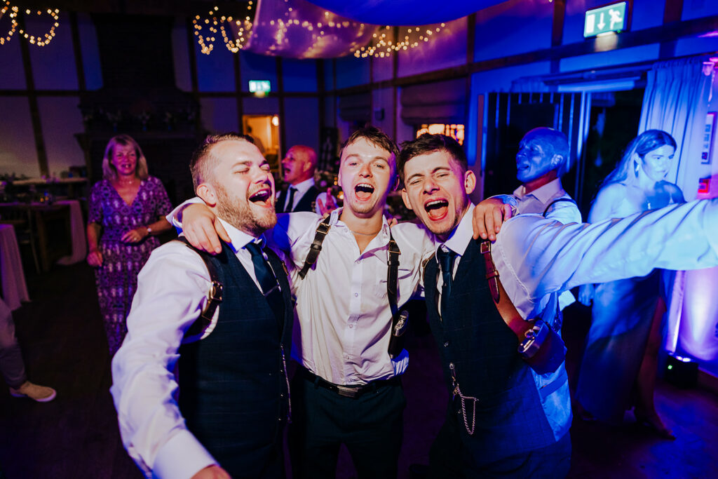 Grooms partying at Burley Manor Barn